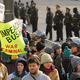 Some of the 24,999 protesters who showed up to turn their backs on Bush.